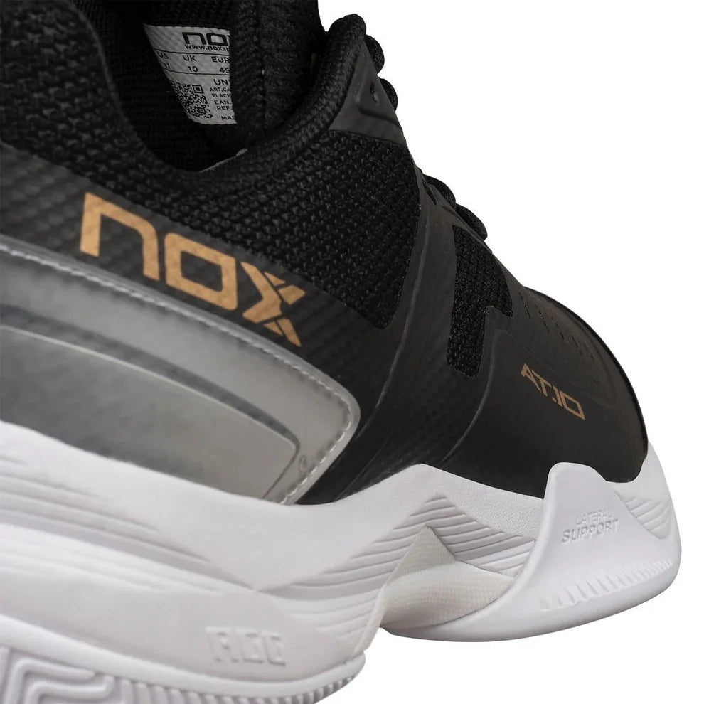TENIS NOX AT10 PRO NEGRO/DORADO